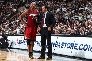 Coach Spo talks to Ray Allen on the sidelines.